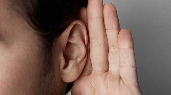 Closeup-of-a-Man's-Ear-During-a-Comprehensive-Audiological-Evaluation