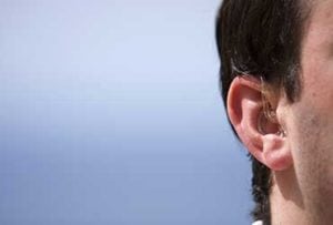 Man-with-BAHA-Hearing-Aids