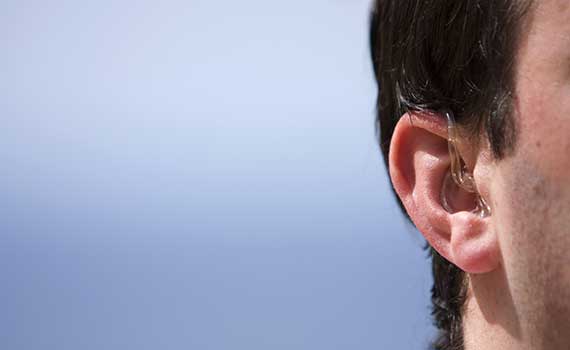 Man-with-BAHA-Hearing-Aids