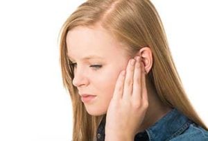 Young-Girl-Using-CROS-Hearing-Aids-UCI-Audiology